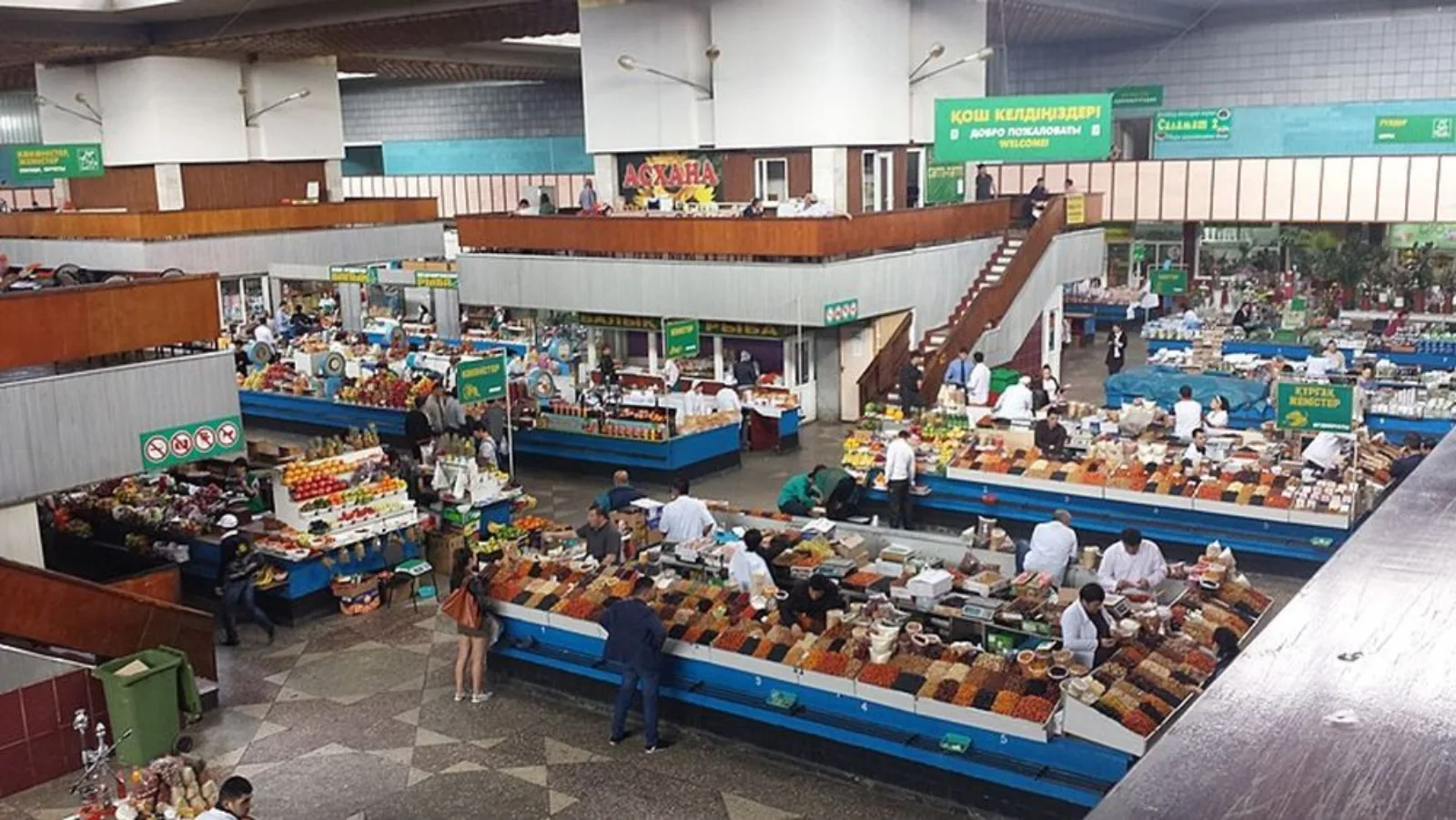 The bustling stalls and upper gallery inside Almaty's Green Bazaar